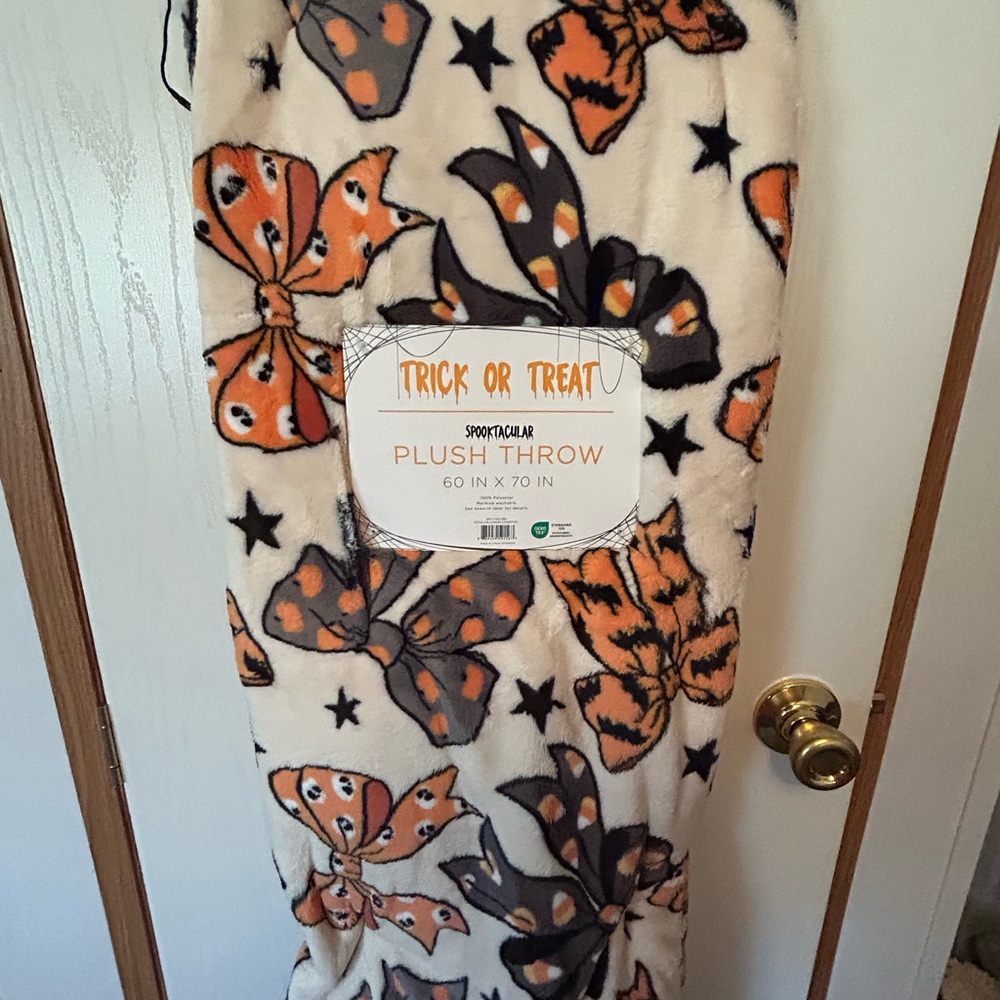 Spooktacular bows on aTrick or Treat Plush Throw .  Soft and cuddly